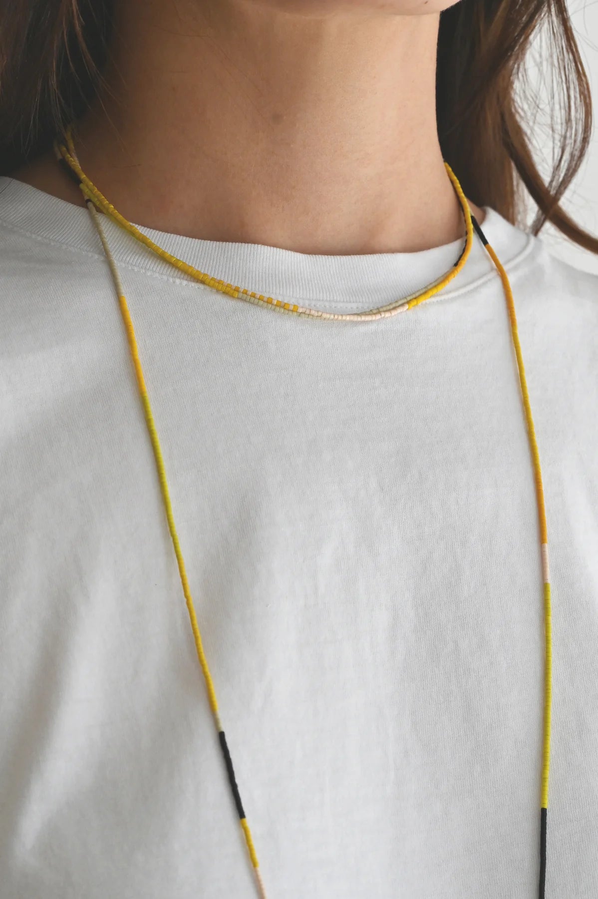 A YELLOW SUN NECKLACE